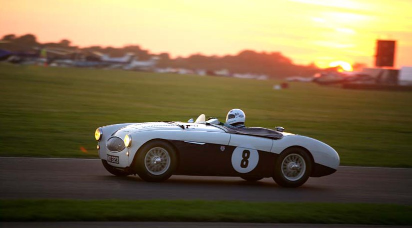 Emanuele Pirro drives the Austin Healey 100S to victory in a race that ran on into the evening